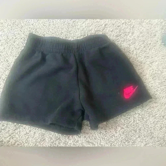 Black and pink Nike shorts. - Picture 1 of 3